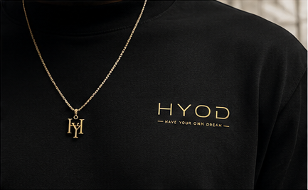 HYOD necklace and embroidered black shirt